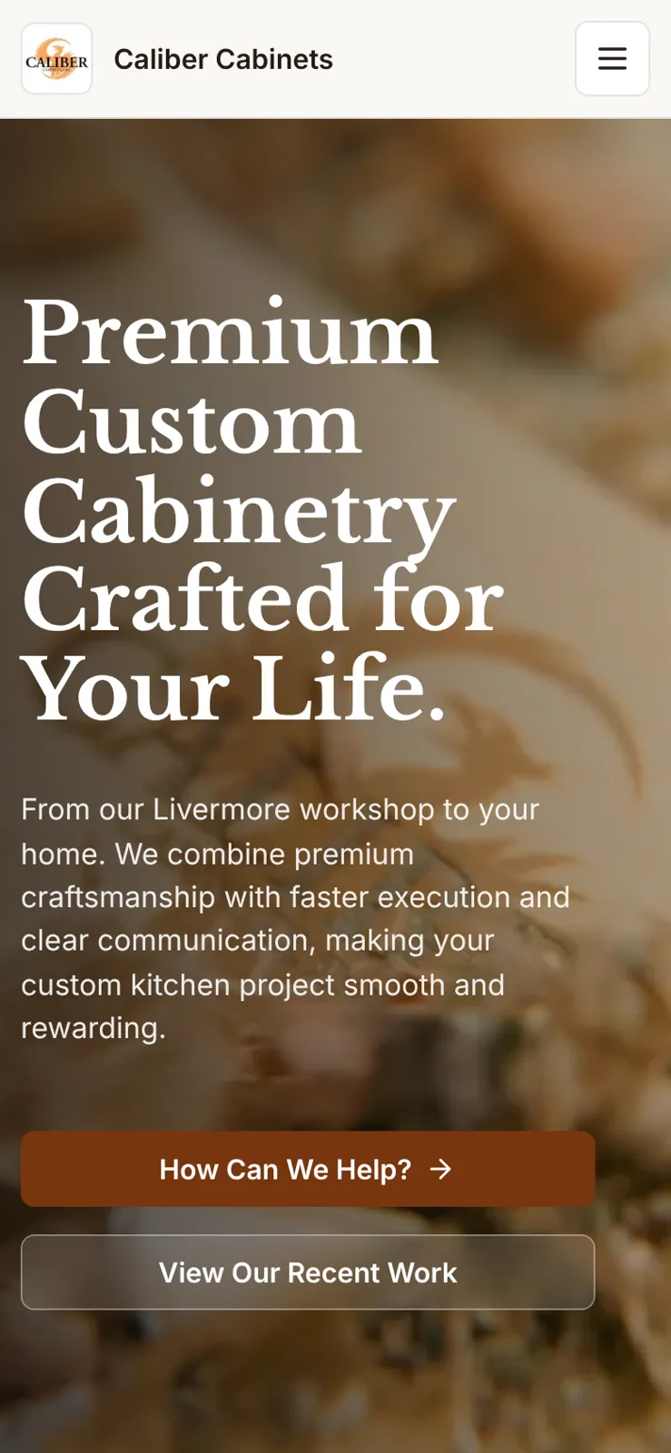 Caliber Cabinets website on a phone