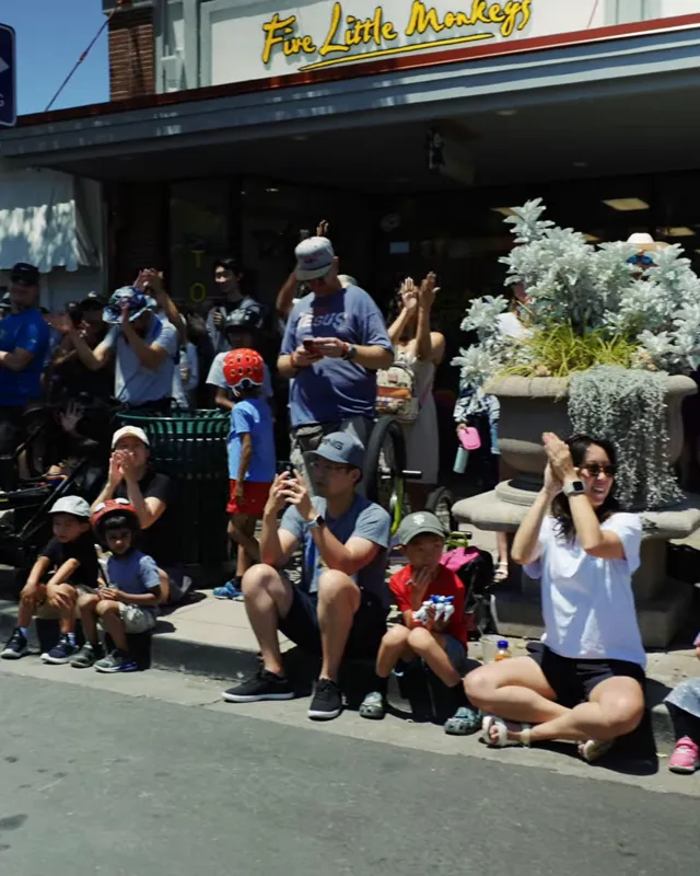 Families lining Main Street to watch the BMX show at Weekends on Main