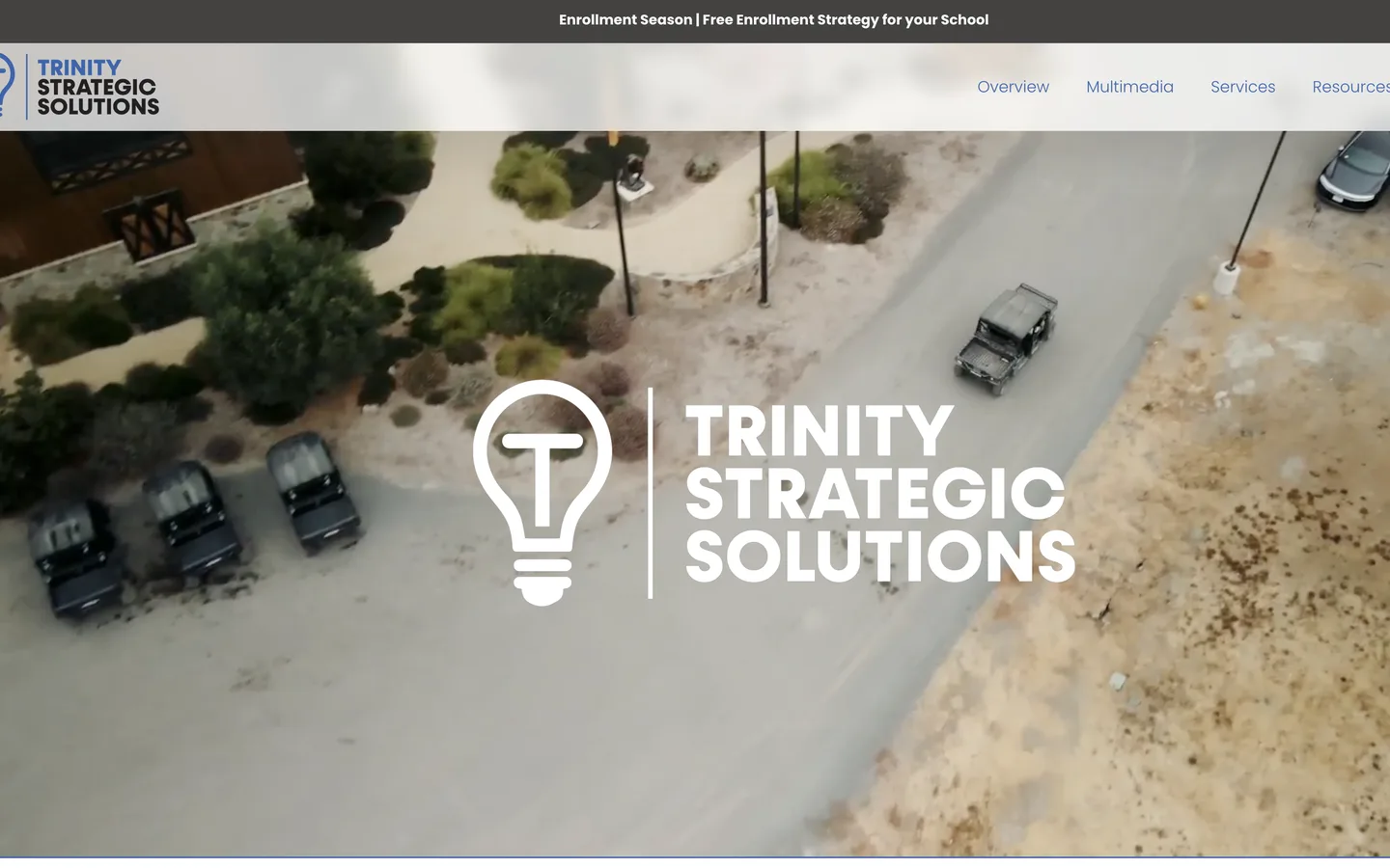 The previous Trinity Strategic Solutions website, with a drone video hero