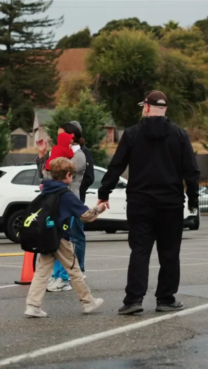 Families arriving at school