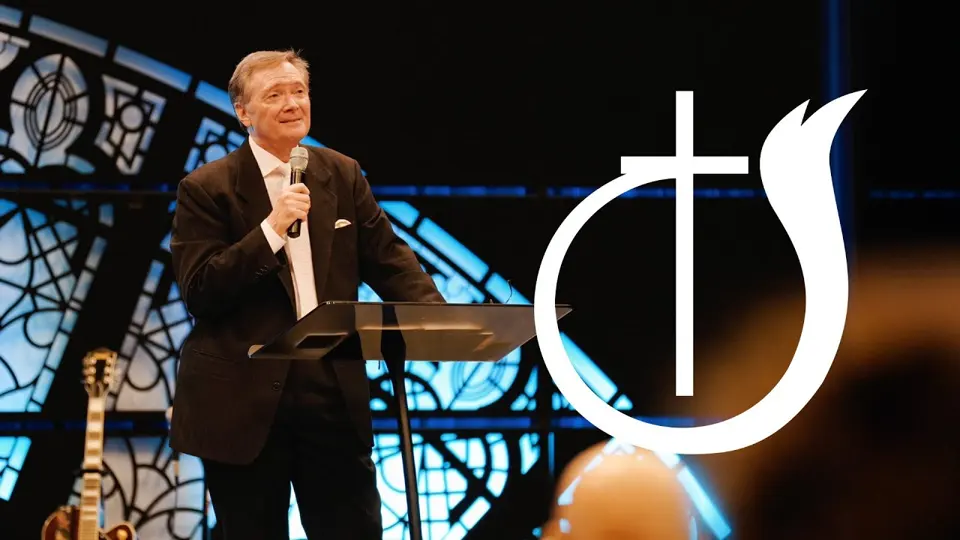 A speaker on stage at the Church of God conference